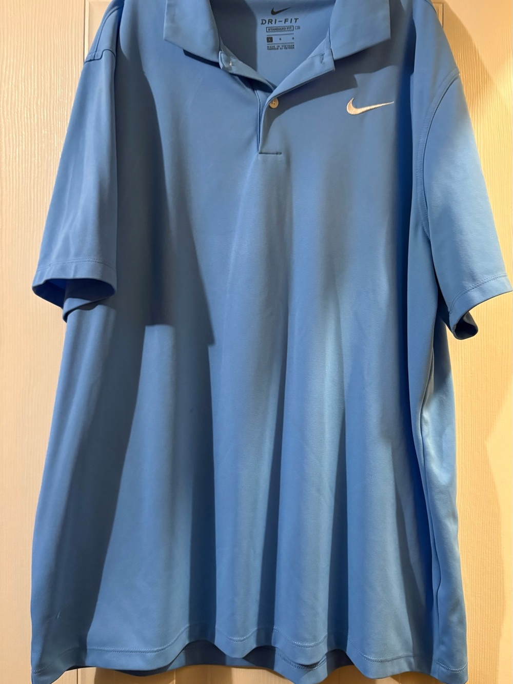 Nike Blue Dri-FIT Polo Shirt with White Swoosh
